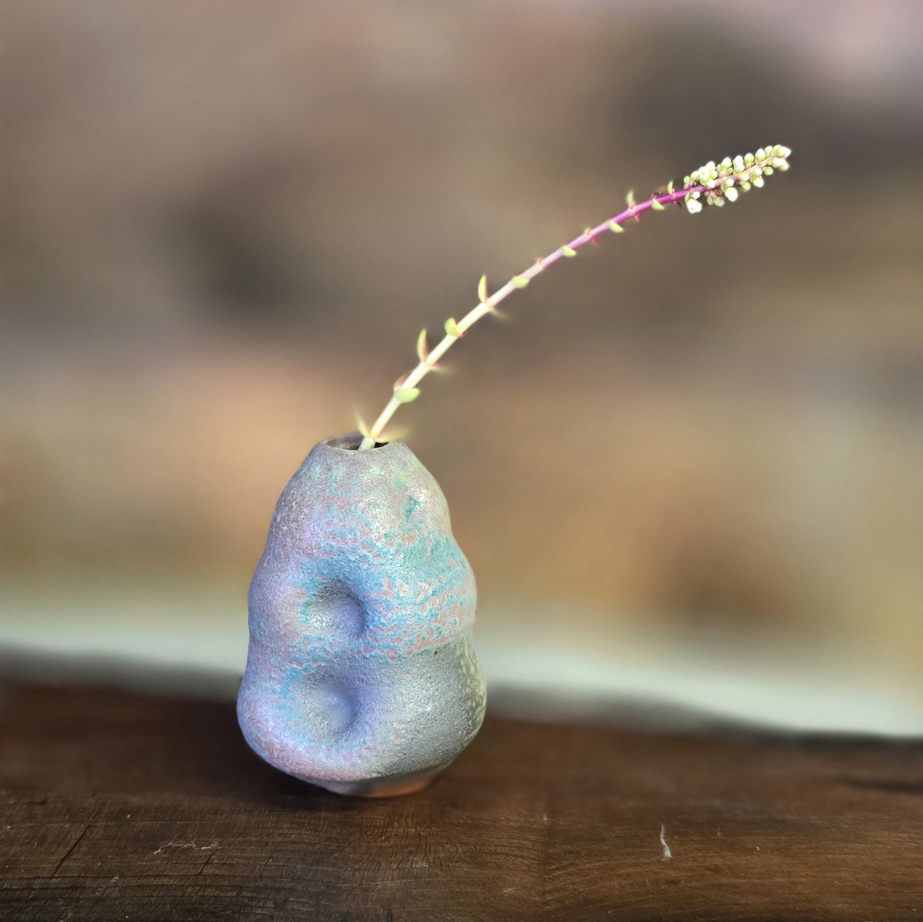 Small blue soda fired vase