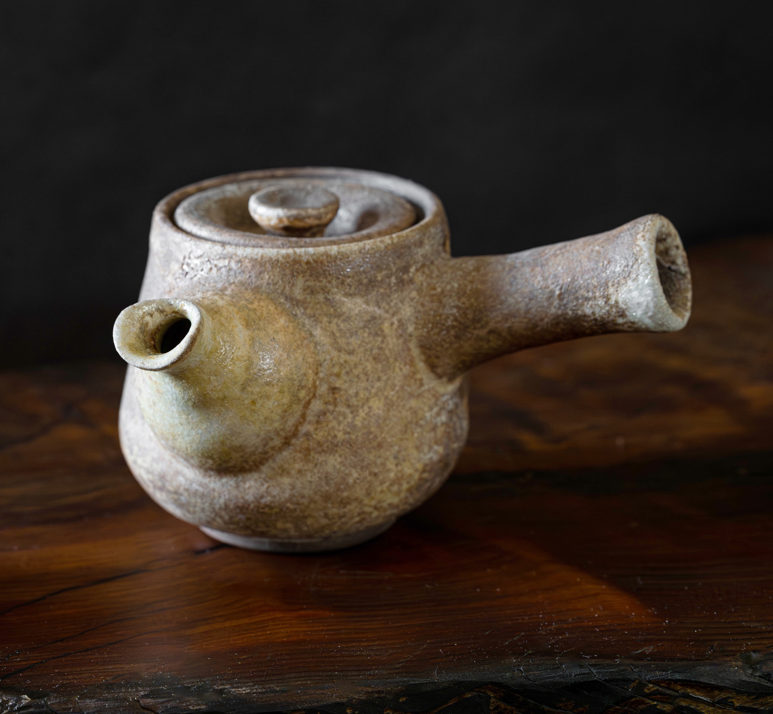 Wood-fired teapot paired with a matching cup