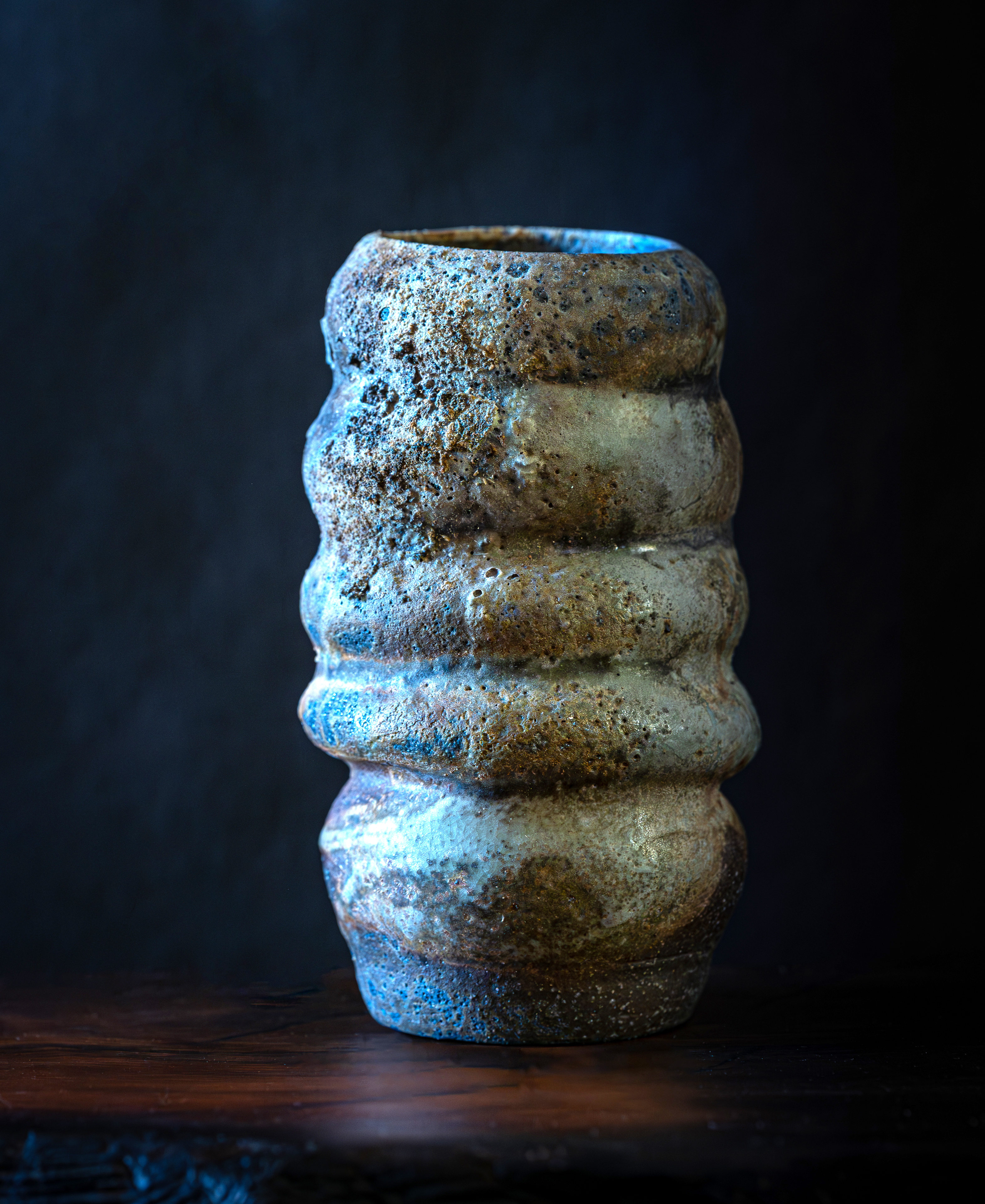 Dark wood-fired ceramic vase